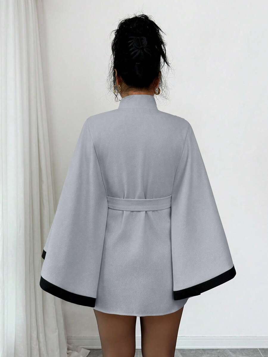 Korte poncho dames - afbeelding 7